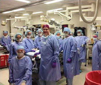 multiple doctors in an operating room